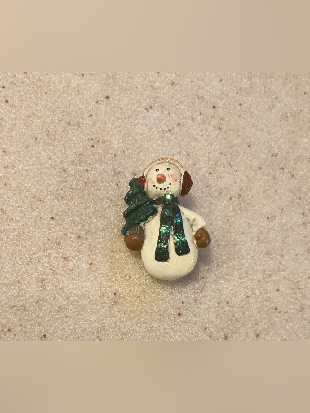 Festive White Snowman Ornament with Green Tree and Scarf